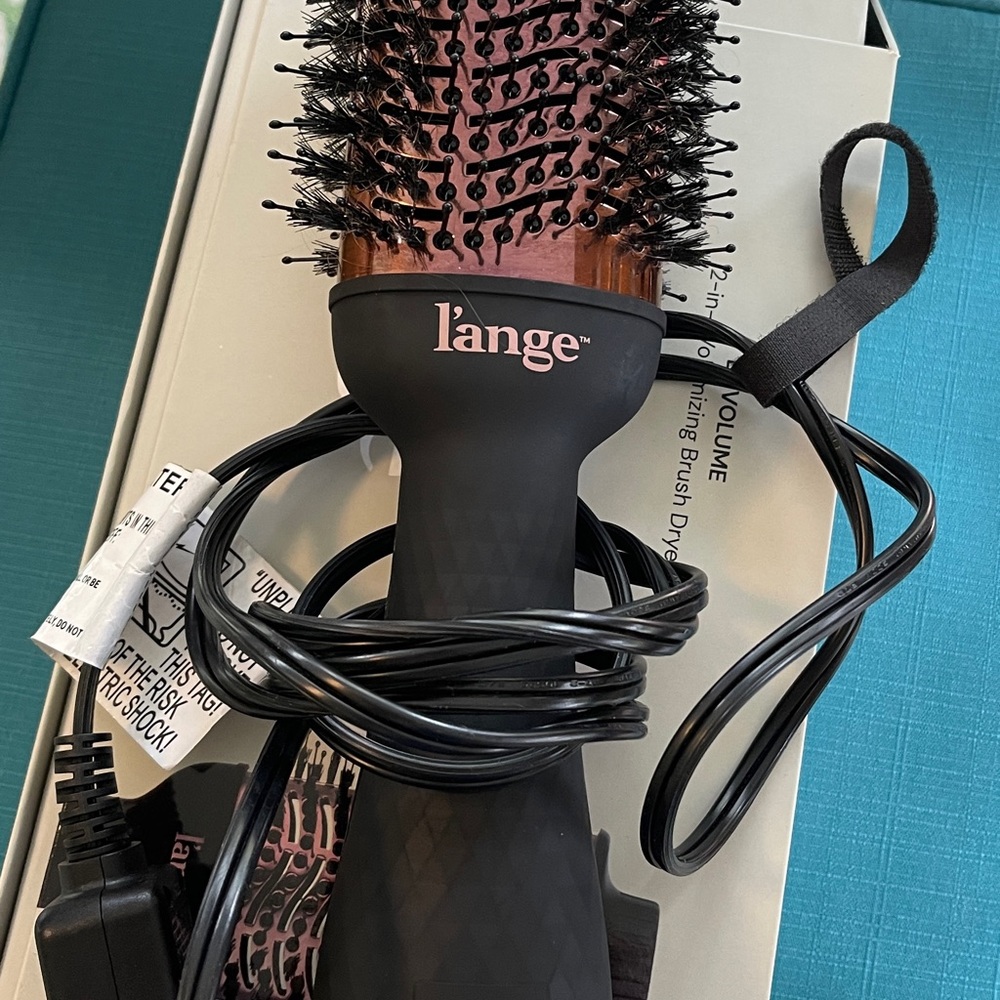 Lange Volumizing hair brush dryer.